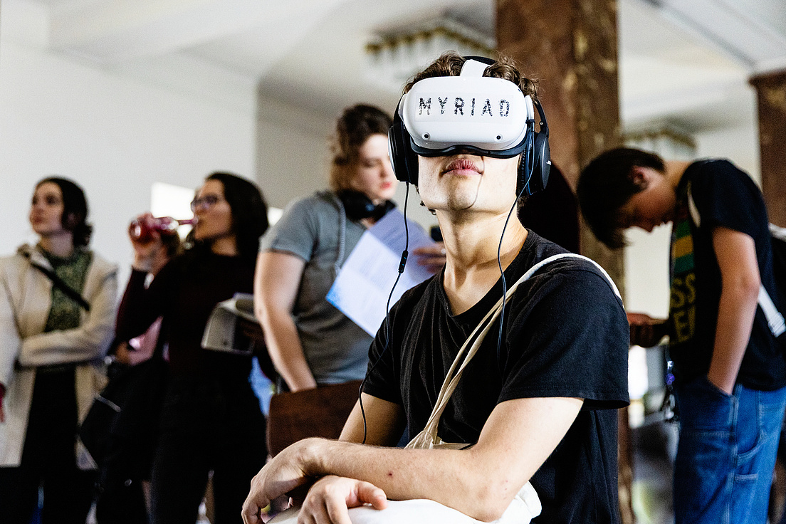 Person wears virtual reality glasses